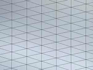 Contemporary Decorative Item Prints: A gray surface featuring a modern geometric pattern composed of interconnected triangles