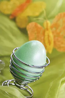 Christian Easter Traditions Prints: Green Easter egg in spiral eggcup