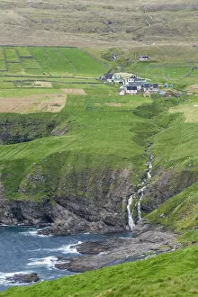 Faroe Islands Landscape Prints: Green fields with a waterfall on the coast