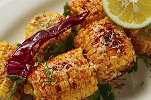 Grilled Corn Prints: Grilled corn with spices, top view
