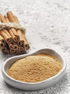 Food Photography Gray Background Prints: Ground cinnamon on gray background