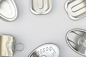 Empty Tin Can Prints: Group of empty tin can isolated on a gray background