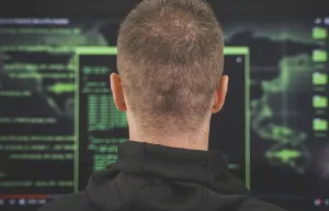 Cybercrime Prevention Tips Prints: Hacker. Rear view. Hacking and internet security concept