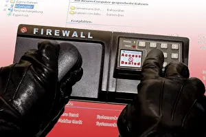 Data Theft Prevention Prints: A Hacker tries to get into a Firewall secured Computer