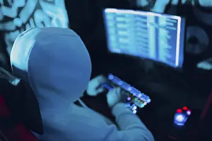 Hacker Attack Prevention Prints: Hacker using computer malware virus software and hacking binary code green digital interface