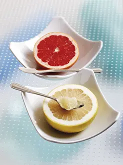 Grapefruit Nutrition Prints: Half of a grapefruit and grapefruit ruby in porcelain bowls