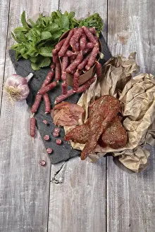 Pork Meat Products Prints: Ham and different vegetables on a studio background