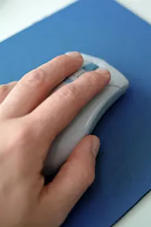Electronic Technology Prints: Hand on computer mouse