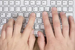 Computer Keyboard Prints: Hands typing on a computer keyboard
