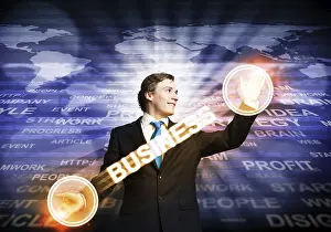Handsome Businessman Suit Prints: Handsome businessman in suit using virtual interface of computer application