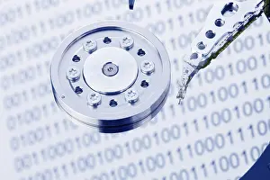 Plain Colored Background Image Prints: The hard disc of a computer in front of a white background Austria