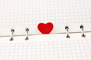 Symbolic Love Image Prints: Heart on a checked notebook