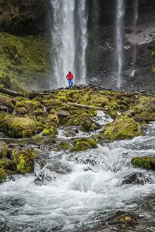 Female Hiker Waterfall Prints: Hiker in front of a high waterfall