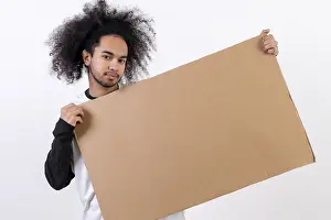 White Studio Background Model Prints: Holding a sign with copy paste space