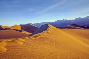 Death Valley Sand Dunes Prints: Human footprints visible along the crest of the dune