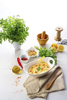 Arabic Food Photography Prints: Hummus paste with lemon and chilli on a white background