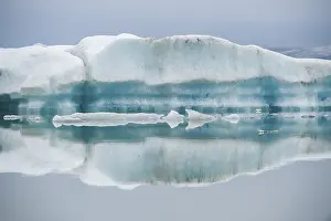 Glacier Lake Reflections Prints: Ice formations are reflected in the still