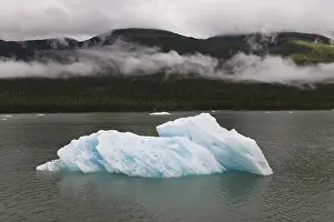 Inside Passage USA Prints: Iceberg and clouds in Inside Passage