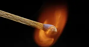 Black Background Photography Prints: Igniting Match against Black background