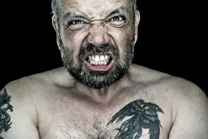 Self Confident Male Prints: An image of an angry man with a beard