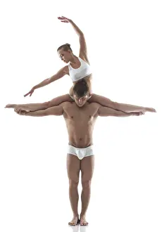 Circus Performers Prints: Image of attractive acrobats posing in studio