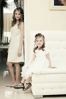 Sisterly Love Images Prints: Image of elegant sisters posing looking at camera