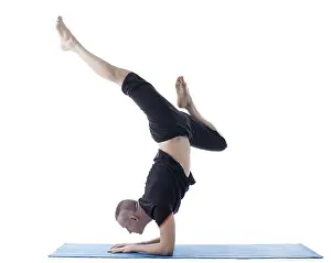 Flexible Yoga Pose Prints: Image of flexible man posing in difficult yoga pose