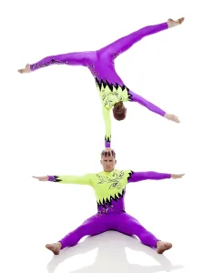 White Background Acrobatics Prints: Image of focused acrobats balancing