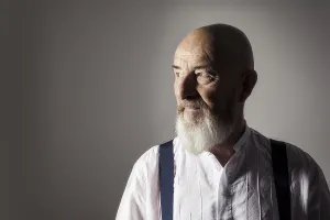 Elderly Man Looking At Camera Prints: An image of an old man with a beard portrait