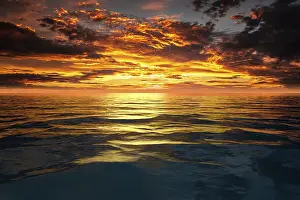 Atmospheric Sunset Over The Sea Prints: An image of a sunset sky at the ocean background