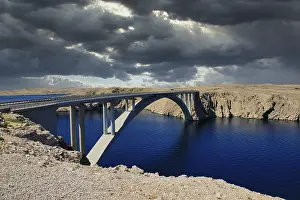 River Prints: Pag Bridge Print: Dramatic Sky Over Croatian River Span