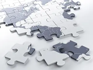 Studio Shot Of A Map Prints: Incomplete puzzle with a world map