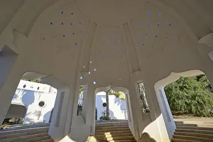 Kallithea Thermal Baths Prints: Interior of a dome-shaped structure with blue light patterns and step-like elements