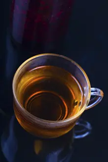 Empty Tableware Setup Prints: Jam and a Cup of tea on a dark background