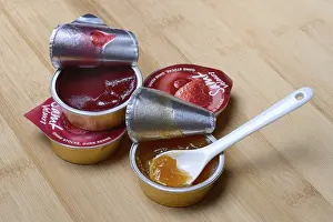 Jam Packaging Waste Prints: Jam in portion pack with spoon, jam