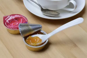 Jam Packaging Waste Prints: Jam in portion pack with spoon, jam