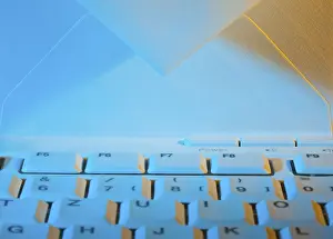 Empty Office Desk Prints: The keyboard of a computer and an envelope