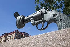 Prints of Knotted Colt Python 357 Magnum revolver, anti-war sculpture by Carl Fredrik Reutersward, Kungsportsavenyen, Gothenburg, Vastra Gotalands lan, Sweden Knotted Colt Python 357 Magnum revolver Gothenburg Prints: Knotted Colt Python 357 Magnum Revolver Print, Gothenburg, Sweden
