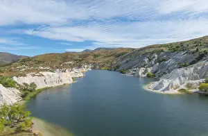 Sculpted Rock Formations NZ Prints: Lake surrounded by limestone cliffs