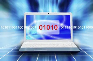 Digital Information Security Prints: Laptop displaying binary code and abstract blue glow