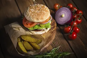 Burger Closeup Prints: Large appetizing burger with beef