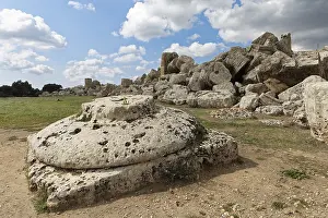 Ancient Temple Ruins Prints: Very large base or capital in front