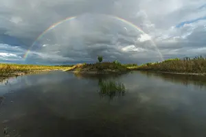 Deserted European Scenery Prints: Large double rainbow after a spring storm
