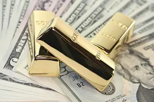 Golden Means Of Payment Prints: Three large gold bars on many dollar notes