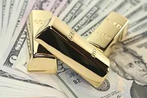 Golden Means Of Payment Prints: Three large gold bars on many dollar notes