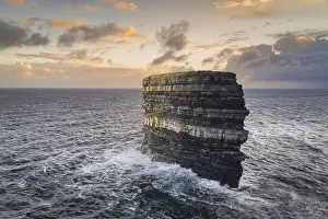 Morning Light On Rocks Prints: Large sea stack Downpatrick Head