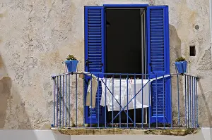 Prints of Laundry drying on a balcony, Otranto, Province of Lecce, Apulia, Italy Otranto Prints: Laundry Drying on a Balcony Print, Otranto, Italy