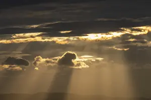 Peaceful Morning Atmosphere Prints: Light rays of the sun's rays through clouds in the morning