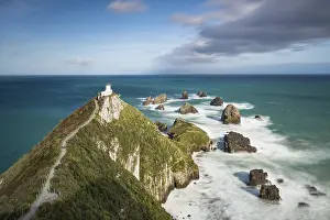 Wave Crashing Against Rocks Prints: Lighthouse at Nugget Point, Catlins
