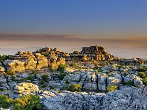 Eroded Limestone Rocks Prints: Limestone rock formations at sunset